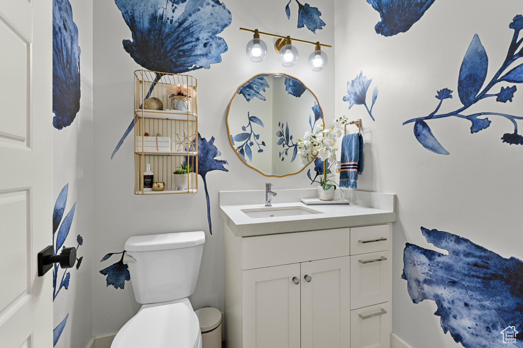 Half bath with toilet and vanity