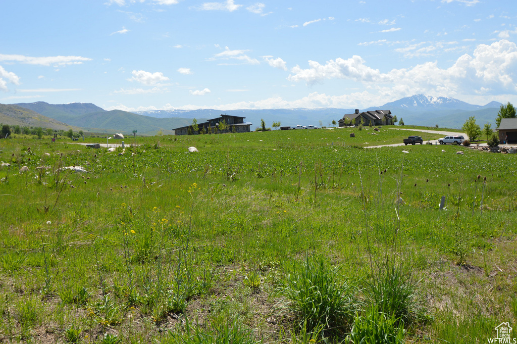 View of mountain feature with a rural view