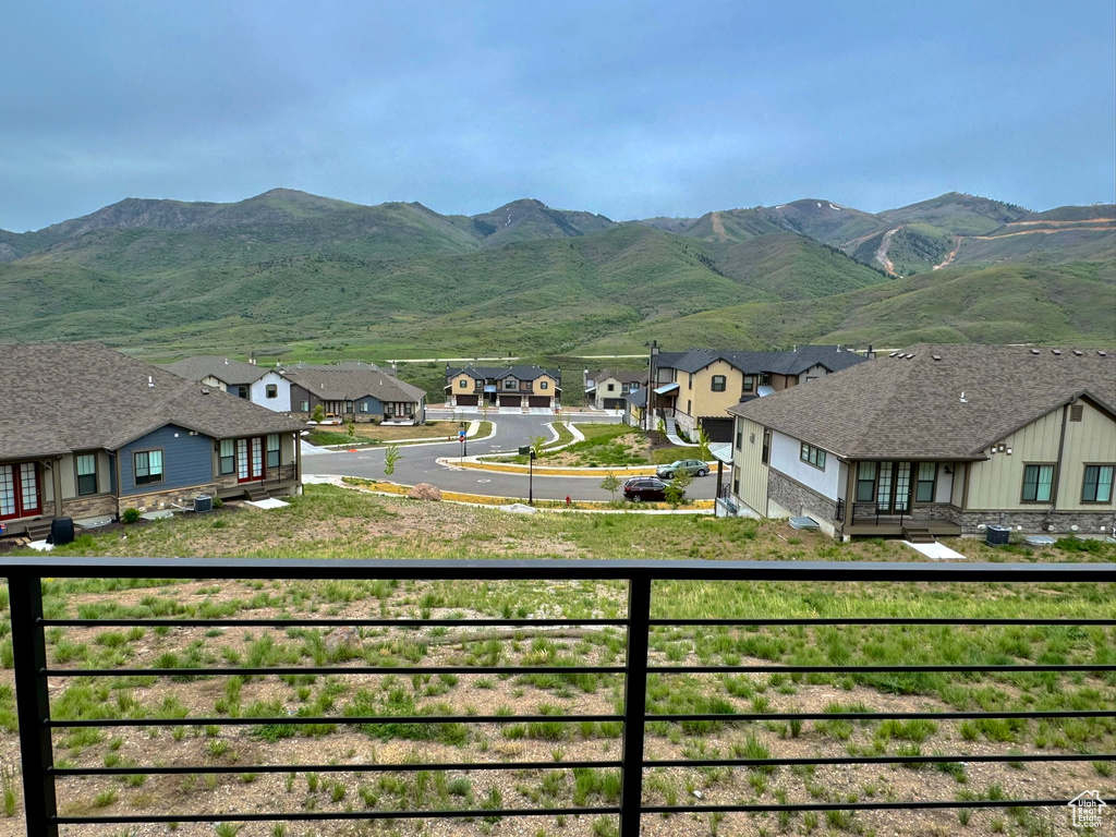 View of mountain background featuring nearby suburban area