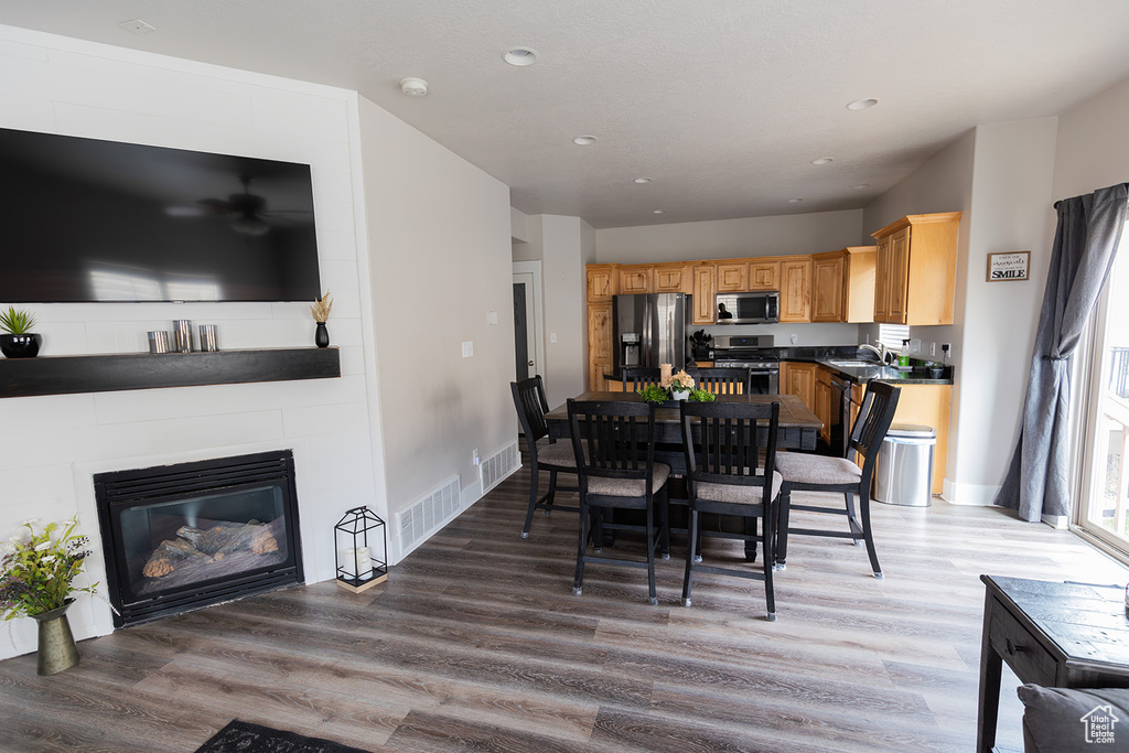 Dining room with visible vents, recessed lighting, and light wood-style floors