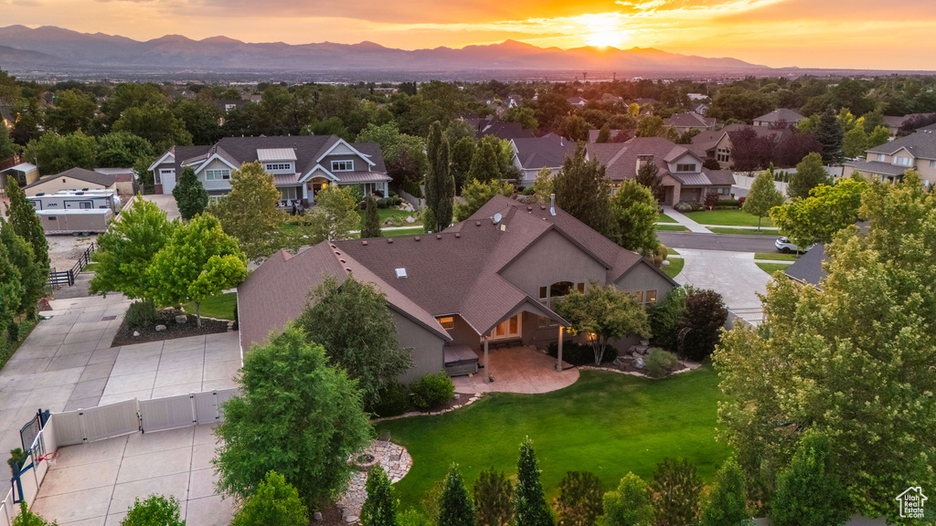 Aerial view of residential area featuring a mountain backdrop