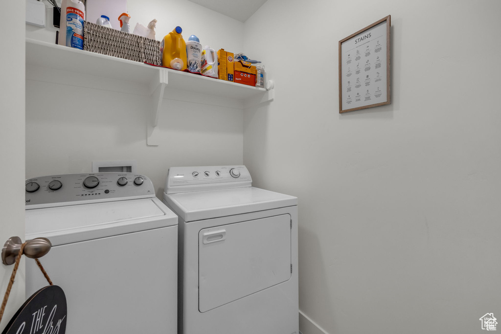 Laundry room featuring laundry area and separate washer and dryer