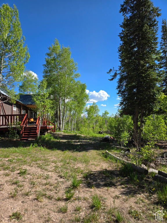 View of yard featuring a deck