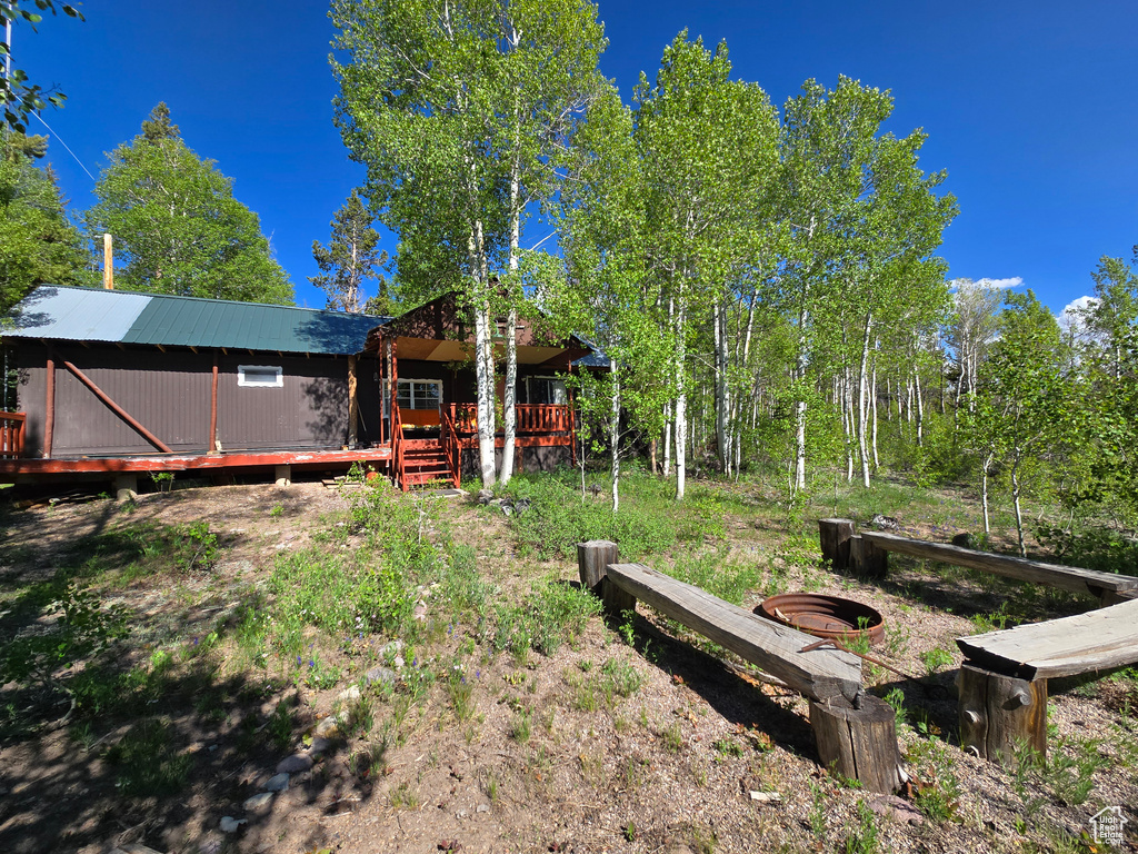 View of yard with a deck