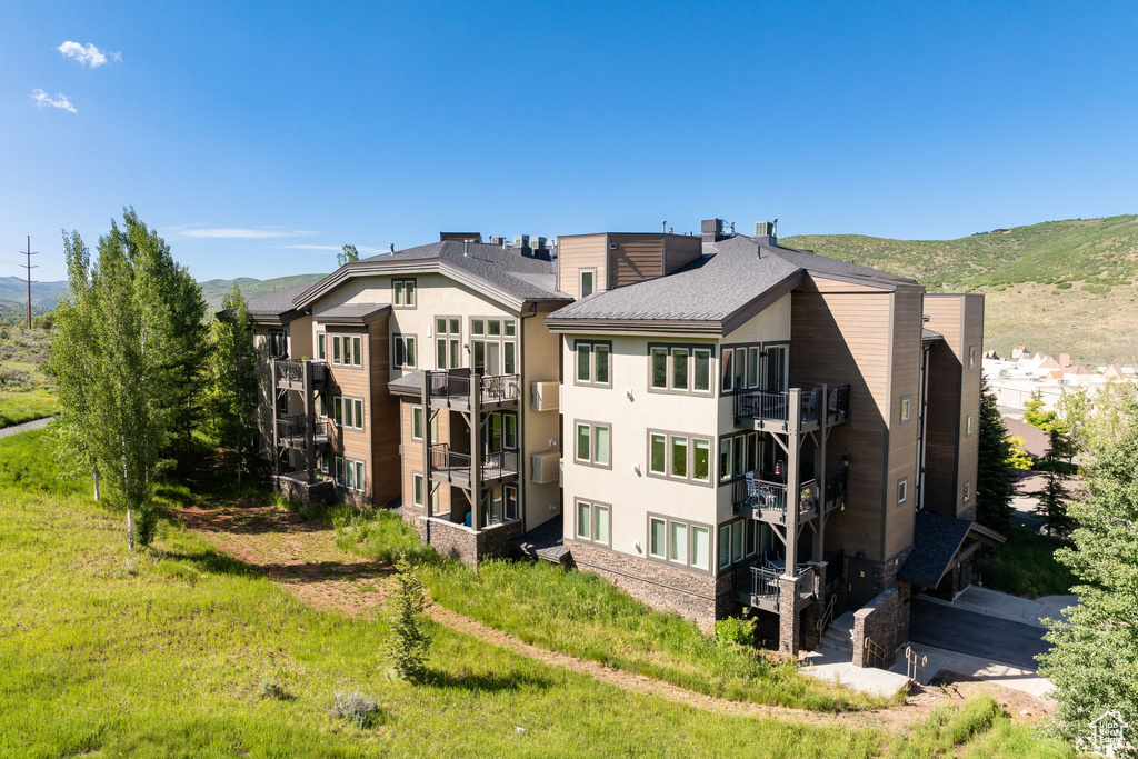 View of building exterior featuring a mountain view