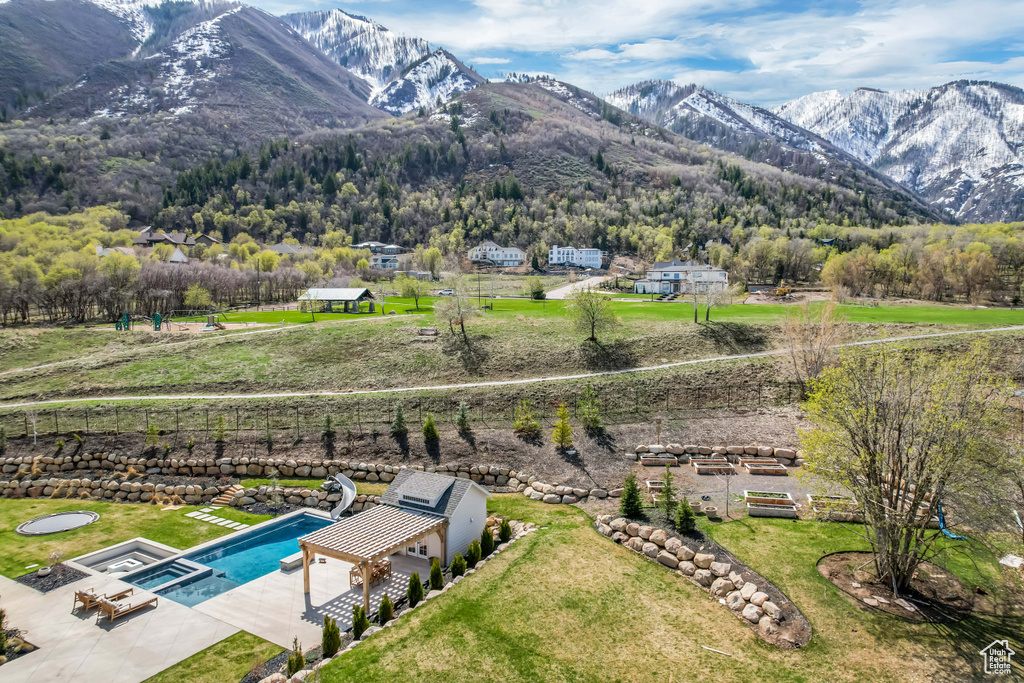 Aerial view of mountains and a pool