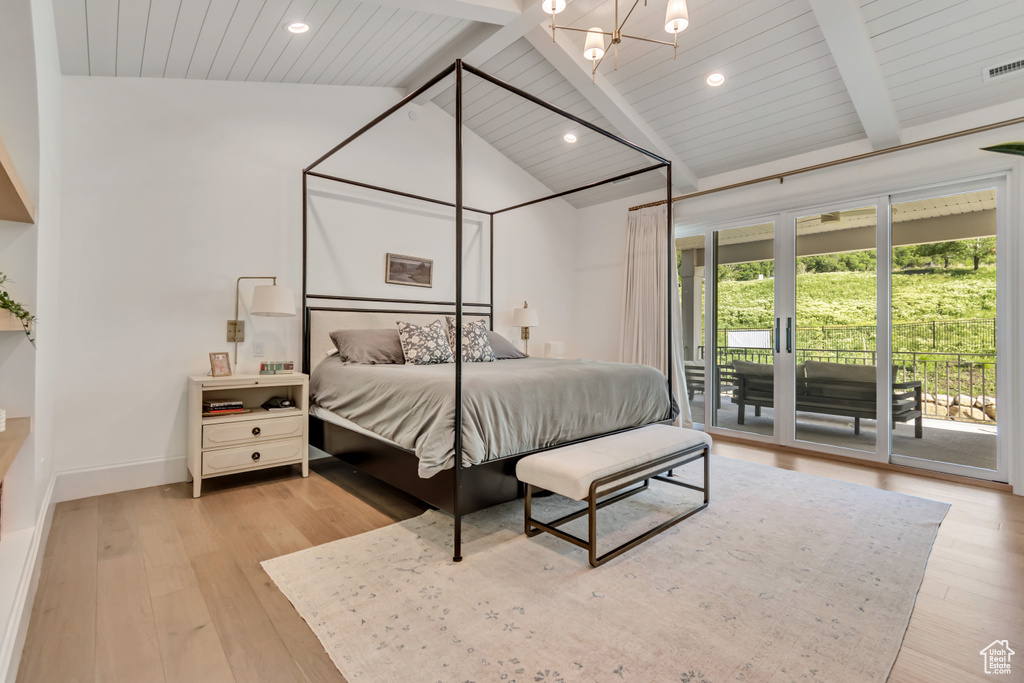Bedroom with access to exterior, light wood-type flooring, a chandelier, wood ceiling, and baseboards
