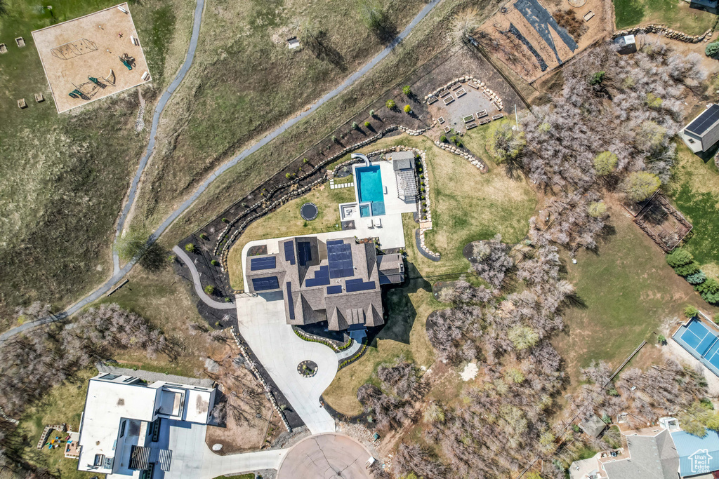 Aerial overview of property\'s location with a pool