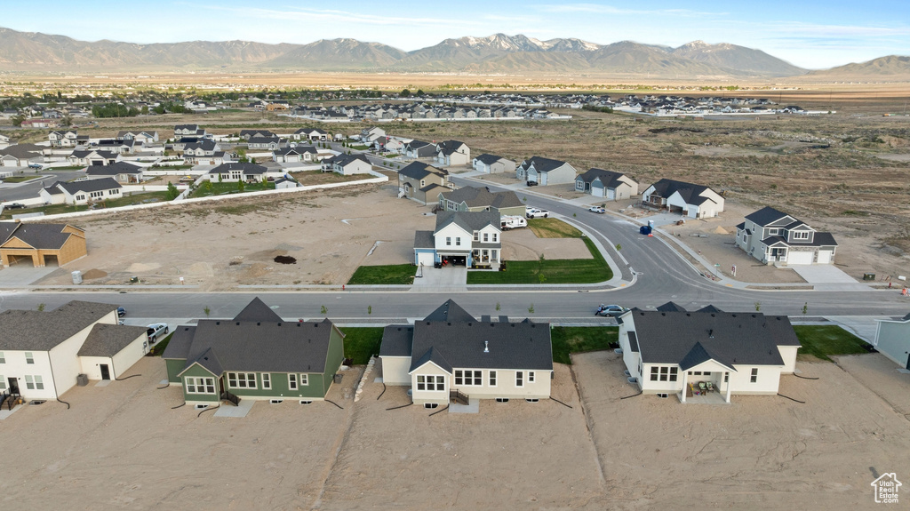 Aerial view of residential area with mountains