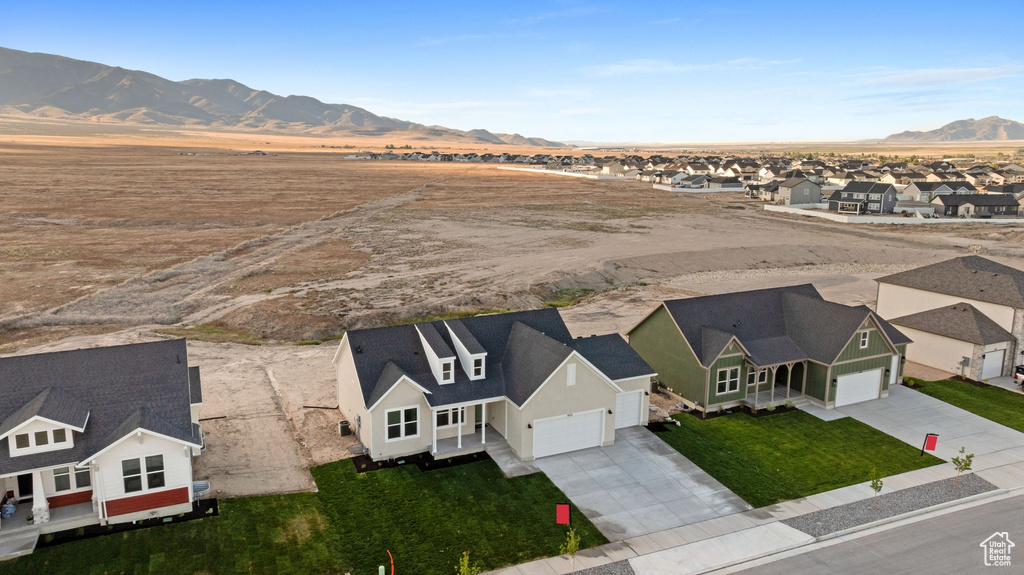 Aerial perspective of suburban area featuring mountains