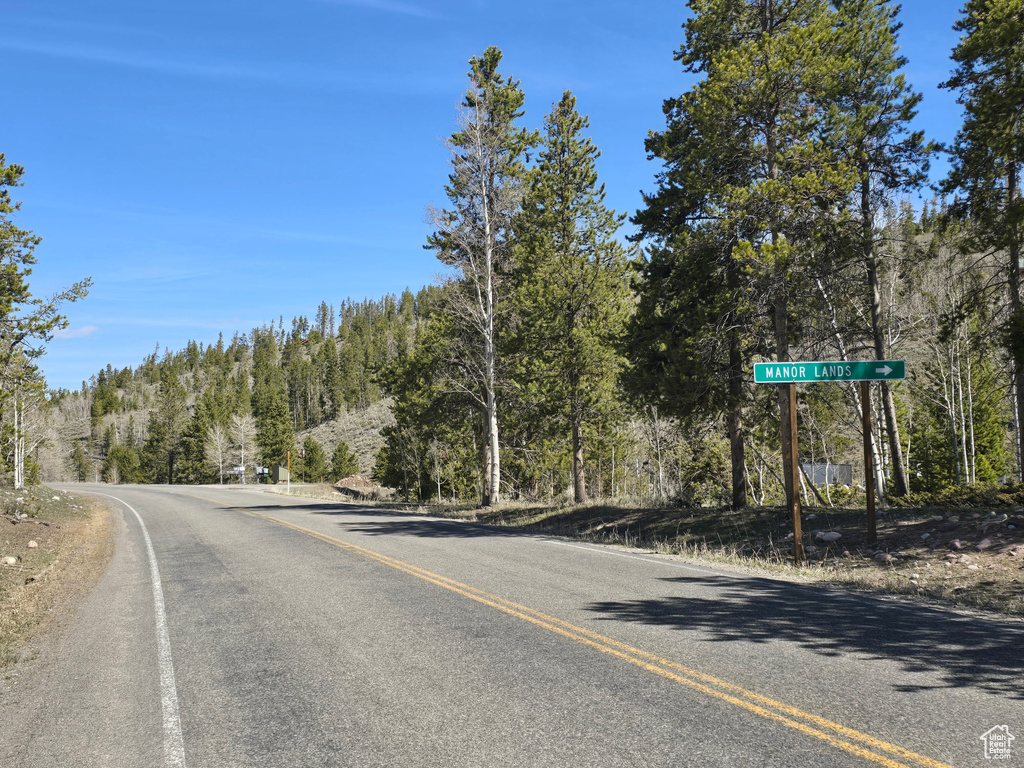 View of street with a forest view