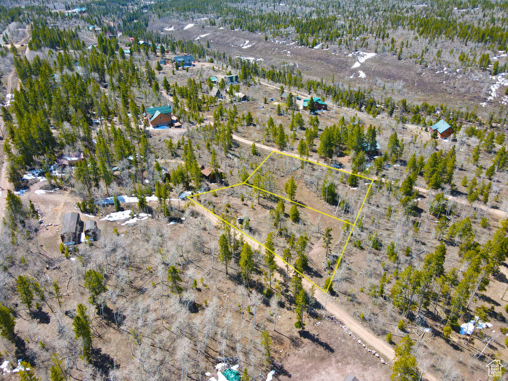 Birds eye view of property featuring a rural view