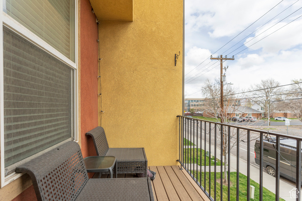 Balcony featuring a residential view