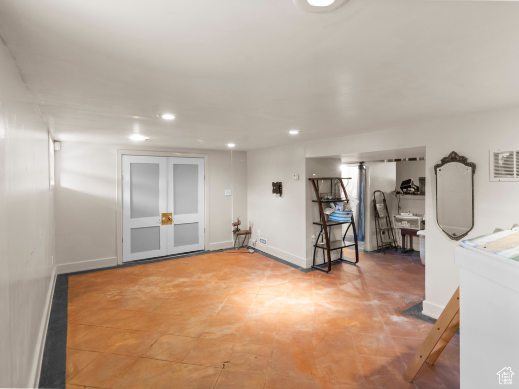 Interior space featuring french doors, baseboards, visible vents, and recessed lighting