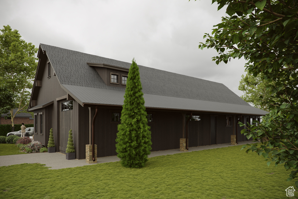 Back of house with a yard