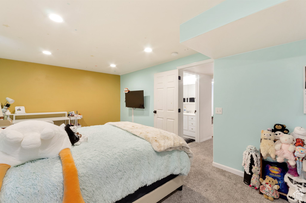 Bedroom with light carpet, recessed lighting, and baseboards