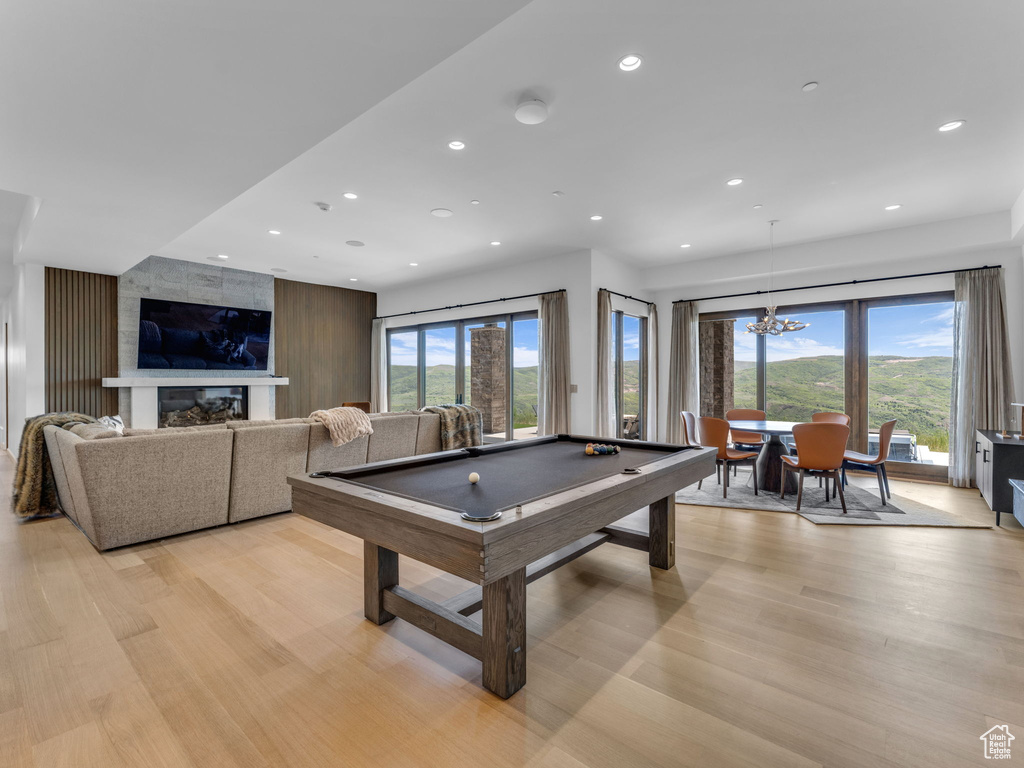 Game room with recessed lighting, light wood finished floors, healthy amount of natural light, and billiards table