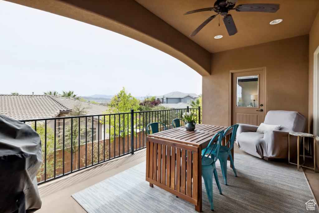 Balcony with grilling area and a ceiling fan