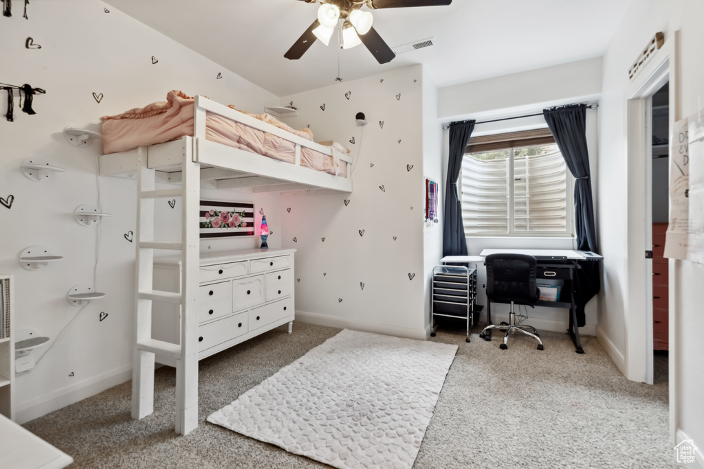 Bedroom with visible vents, baseboards, and carpet floors