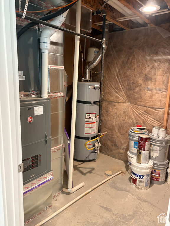 Utilities featuring water heater and heating unit