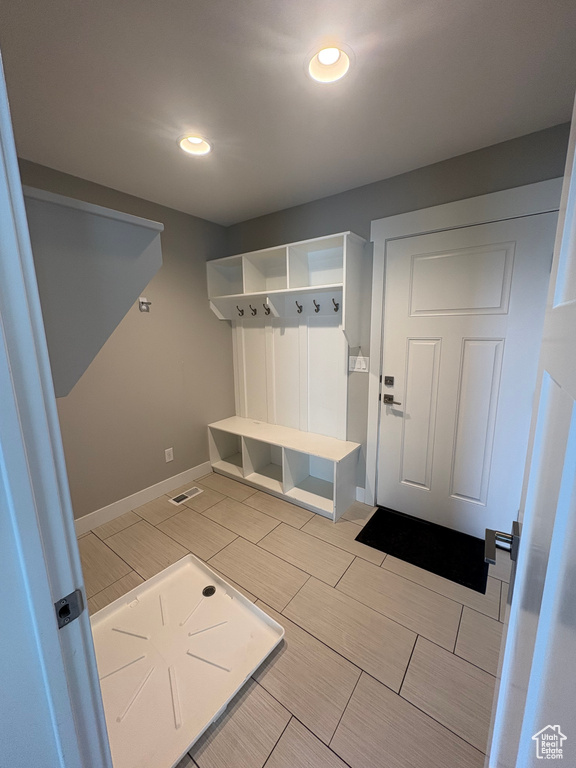 Mudroom with recessed lighting