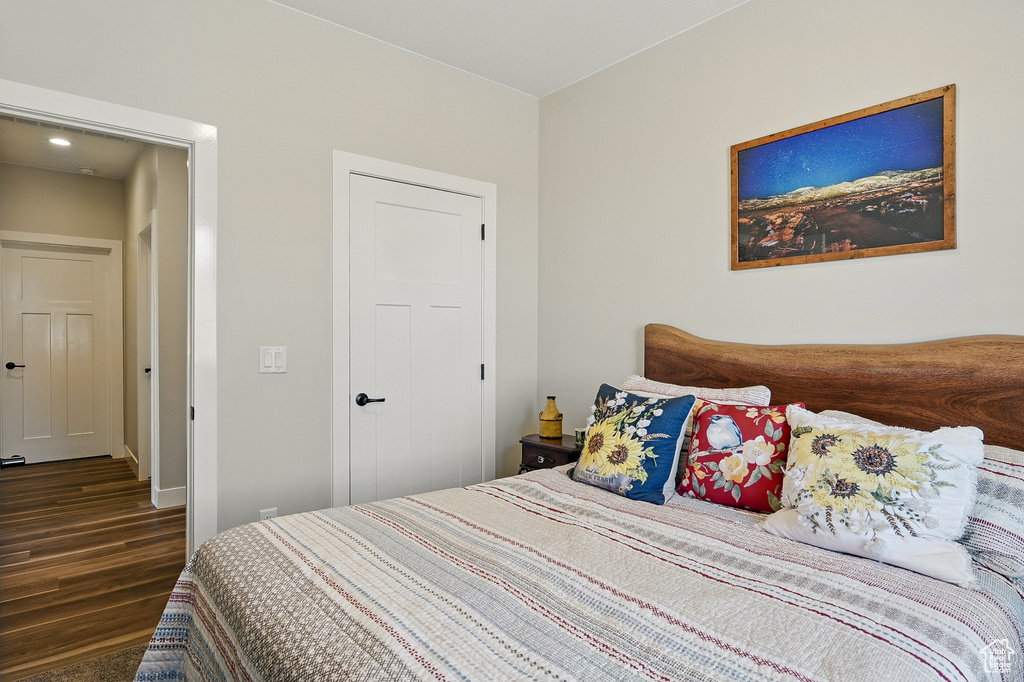 Bedroom with wood finished floors