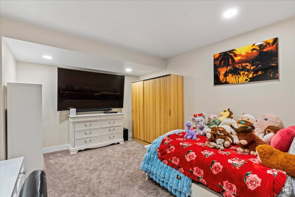 Bedroom with recessed lighting, carpet flooring, and baseboards