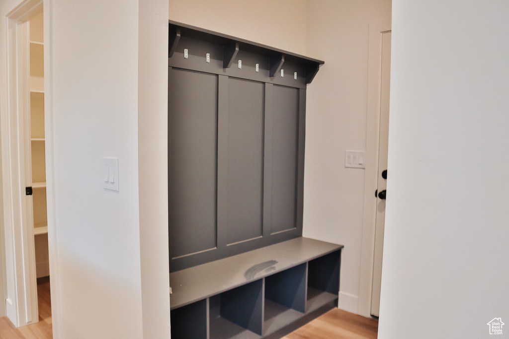 Mudroom featuring light wood-style floors