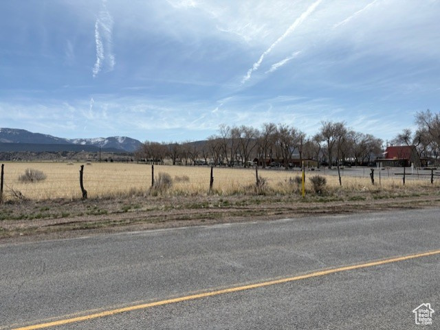 View of road featuring a rural view and a mountain view
