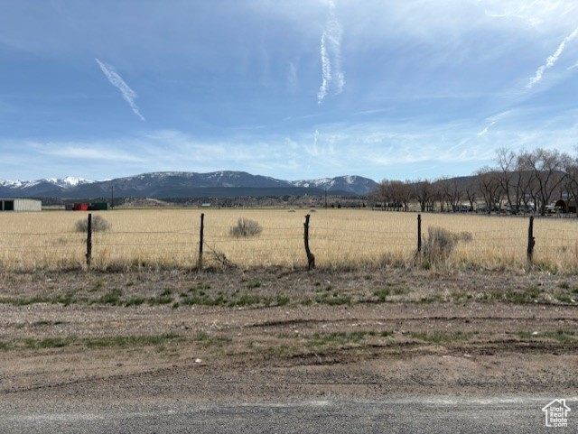 Property view of mountains featuring a rural view