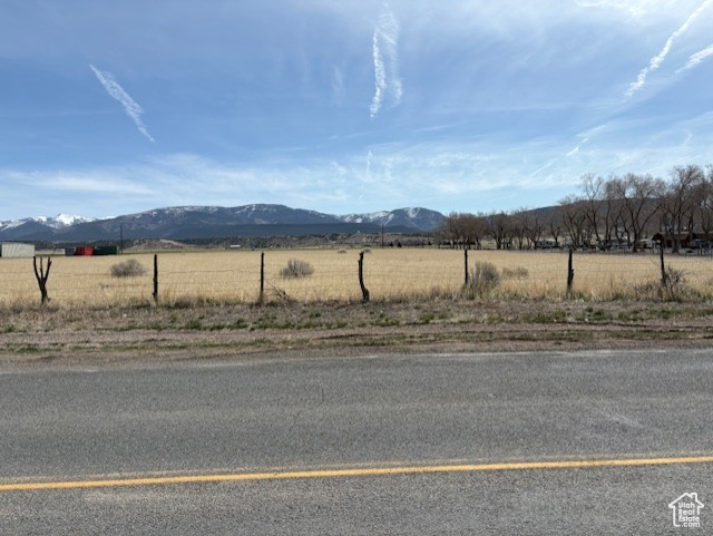 Exterior space featuring a rural view and a mountain view