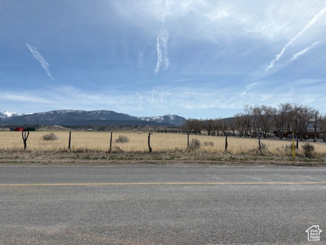 Property view of mountains featuring a rural view