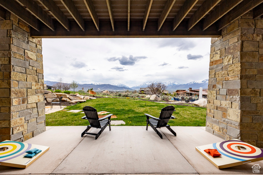 View of patio with a mountain view