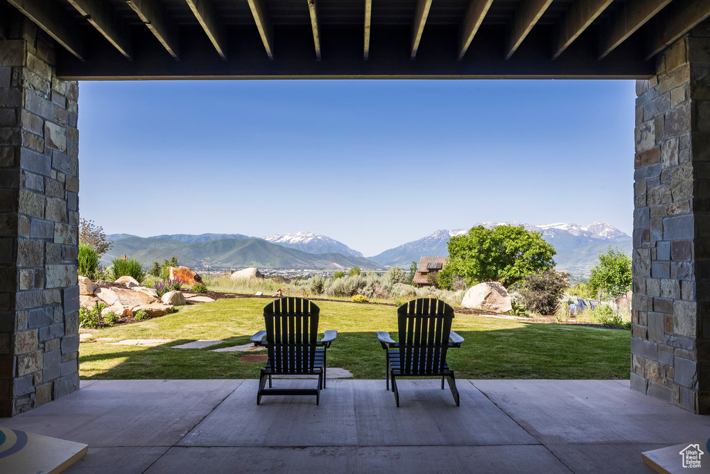View of patio featuring a mountain view