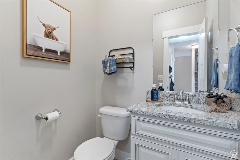 Bathroom with vanity and toilet