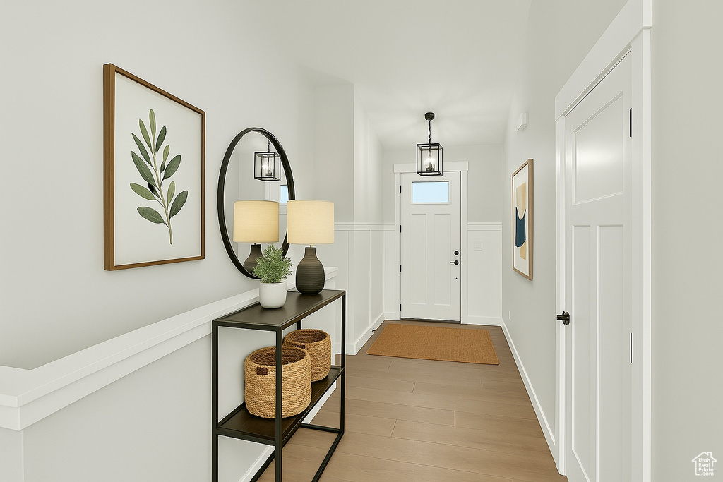 Foyer with wood finished floors