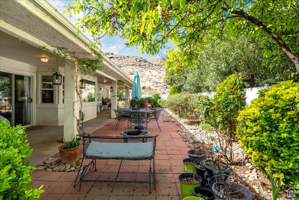 View of patio / terrace featuring fence