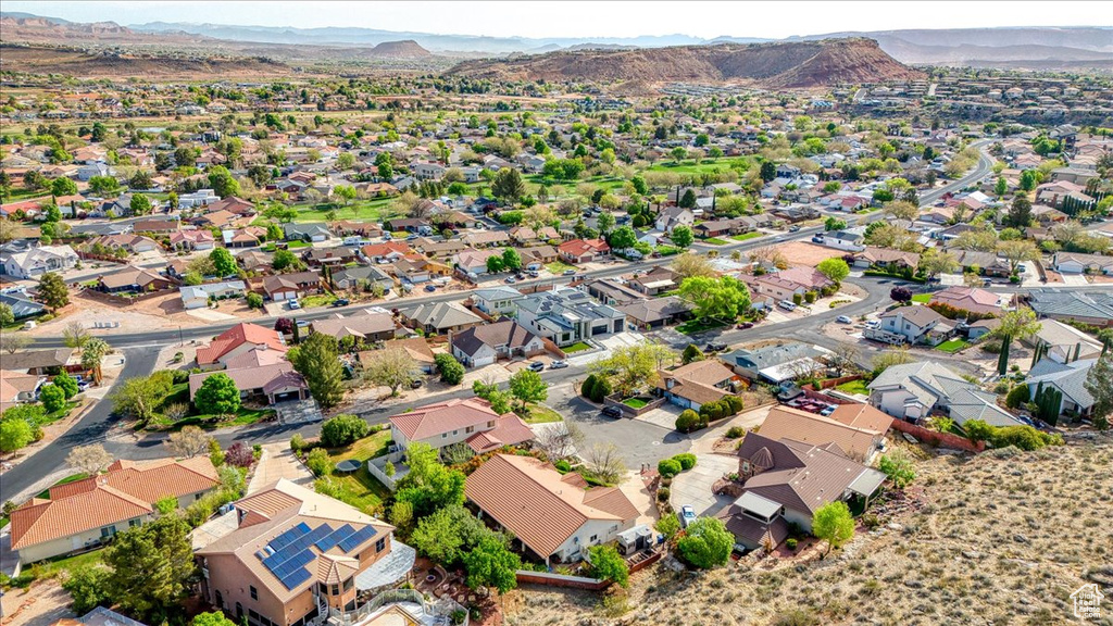 Drone / aerial view with a mountain view and a residential view