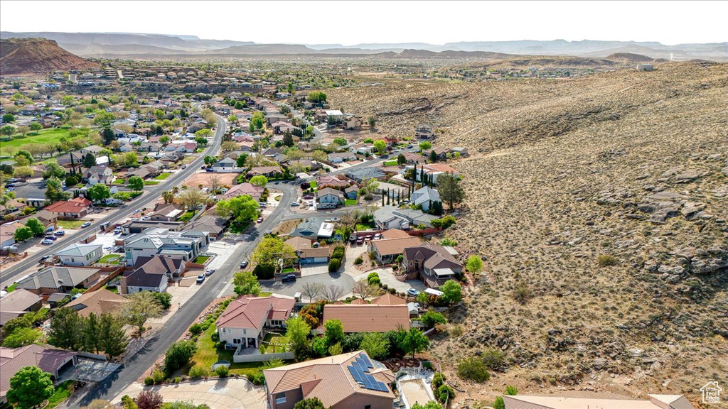 Drone / aerial view featuring a mountain view and a residential view