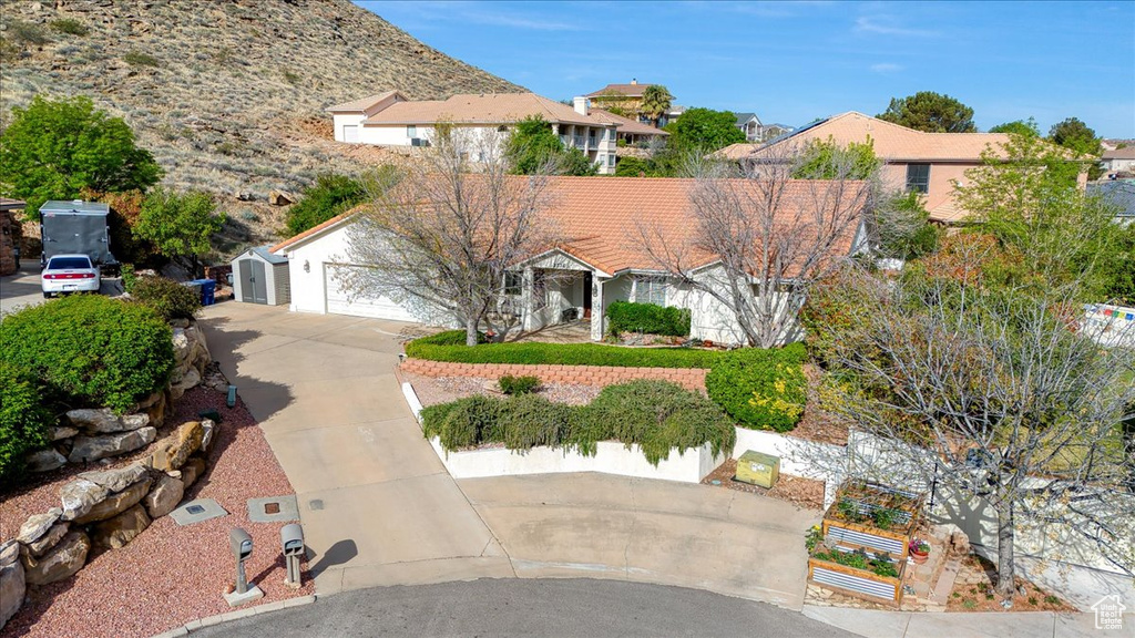 View of front of property featuring driveway