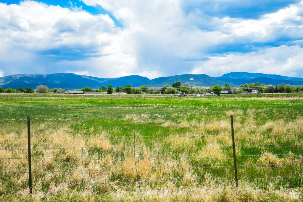 Mountain view featuring rural landscape and a pastoral area