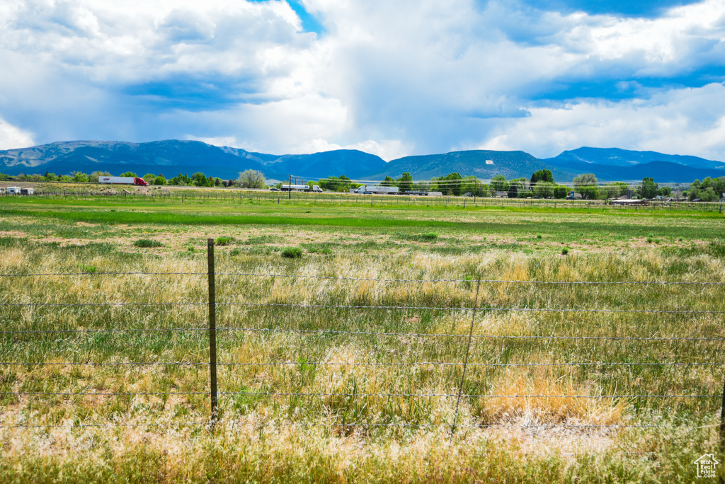 Mountain view featuring rural landscape and a pastoral area