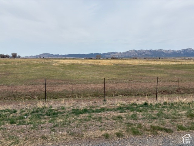 View of mountain feature with a rural view