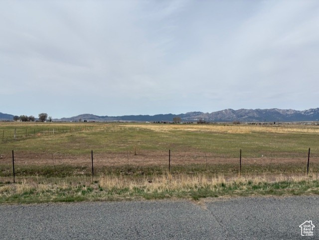 Property view of mountains featuring a rural view