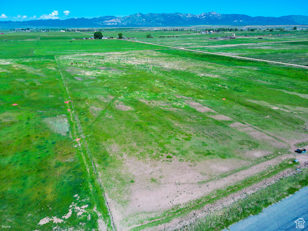Aerial view of sparsely populated area featuring a mountainous background