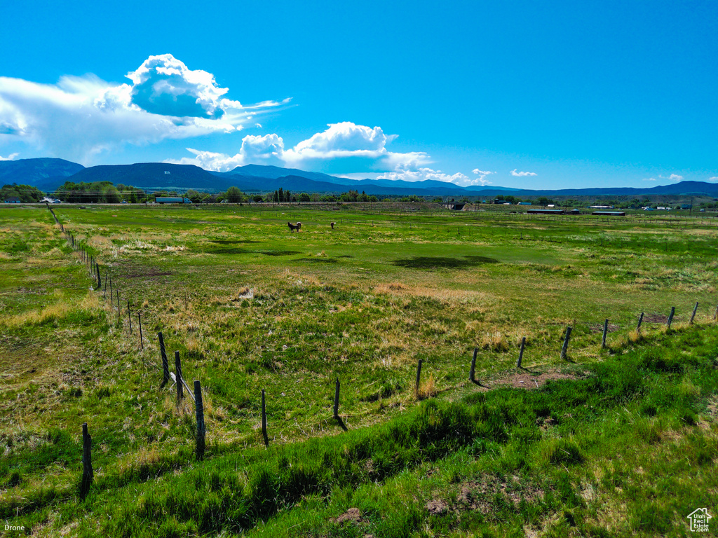 Mountain view with rural landscape and agricultural land
