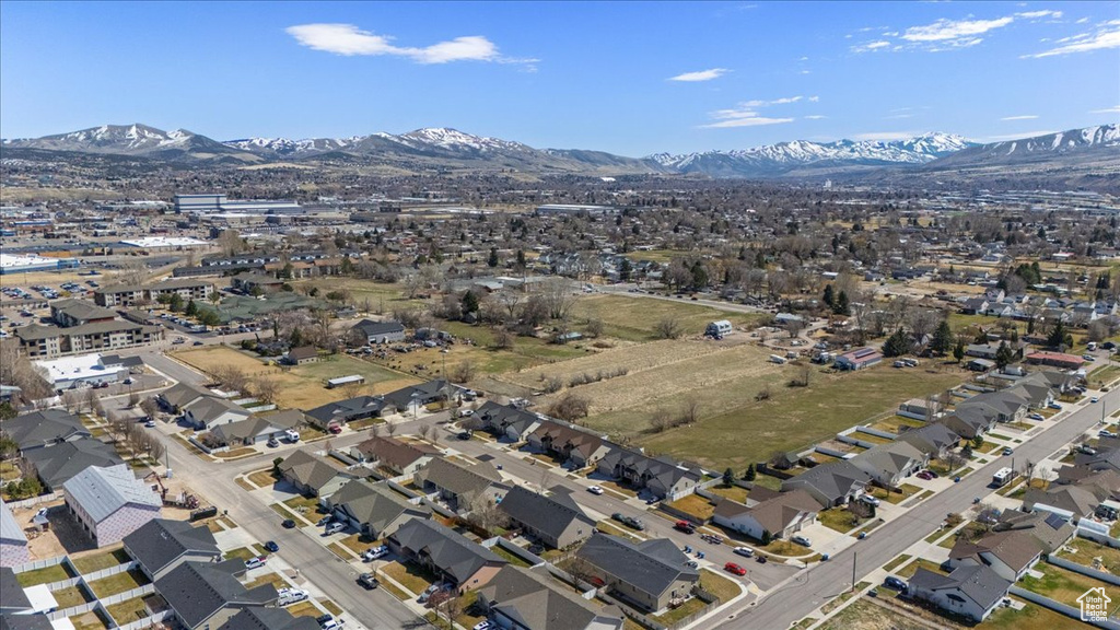 Drone / aerial view featuring a mountain view and a residential view