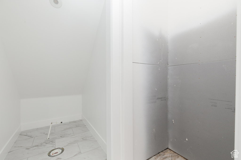 Interior space with marble finish floor and baseboards