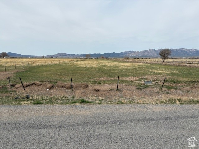 View of mountain feature with a rural view