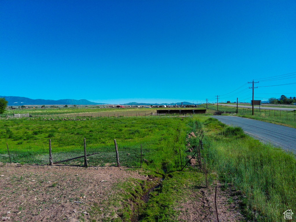 View of street featuring a rural view and a mountain view